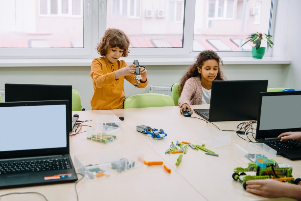 group of kids learning together, stem education concept